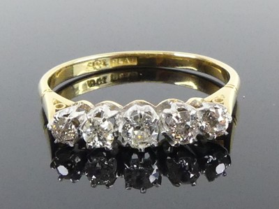 Lot 2504 - A yellow and white metal diamond five-stone...