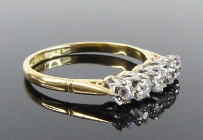 Lot 2504 - A yellow and white metal diamond five-stone...