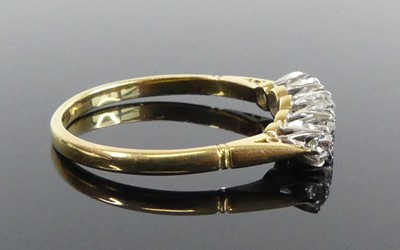 Lot 2504 - A yellow and white metal diamond five-stone...