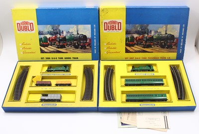 Lot 259 - Two Hornby-Dublo 2-rail 0-6-0 sets, each with...