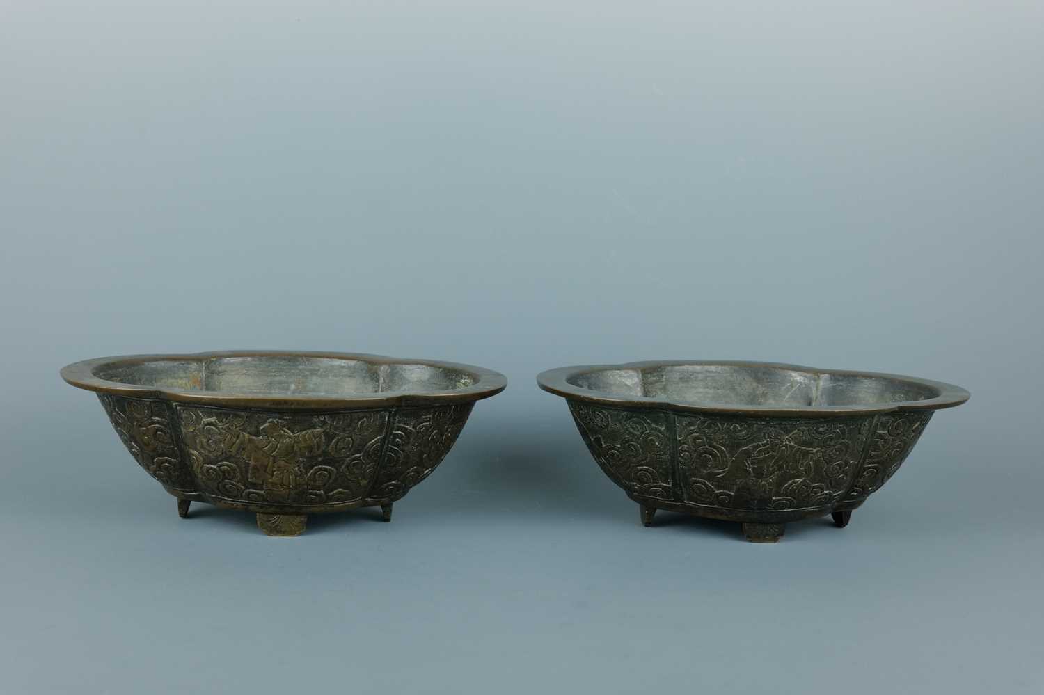 Lot 2071 - A pair of Chinese bronze quatrefoil-shaped...