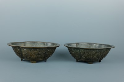 Lot 2071 - A pair of Chinese bronze quatrefoil-shaped...
