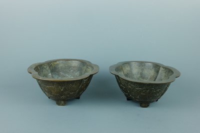 Lot 2071 - A pair of Chinese bronze quatrefoil-shaped...