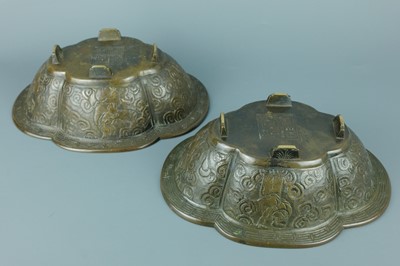 Lot 2071 - A pair of Chinese bronze quatrefoil-shaped...