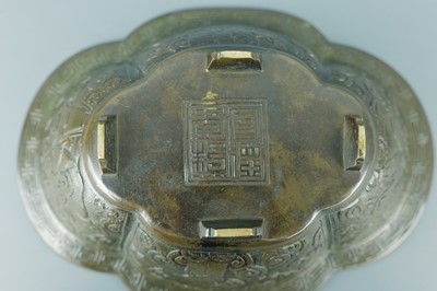 Lot 2071 - A pair of Chinese bronze quatrefoil-shaped...