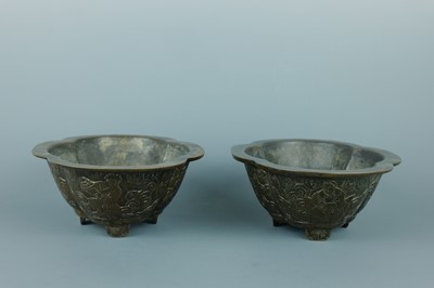 Lot 2071 - A pair of Chinese bronze quatrefoil-shaped...