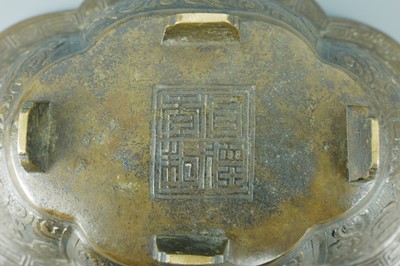 Lot 2071 - A pair of Chinese bronze quatrefoil-shaped...