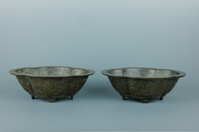 Lot 2071 - A pair of Chinese bronze quatrefoil-shaped...