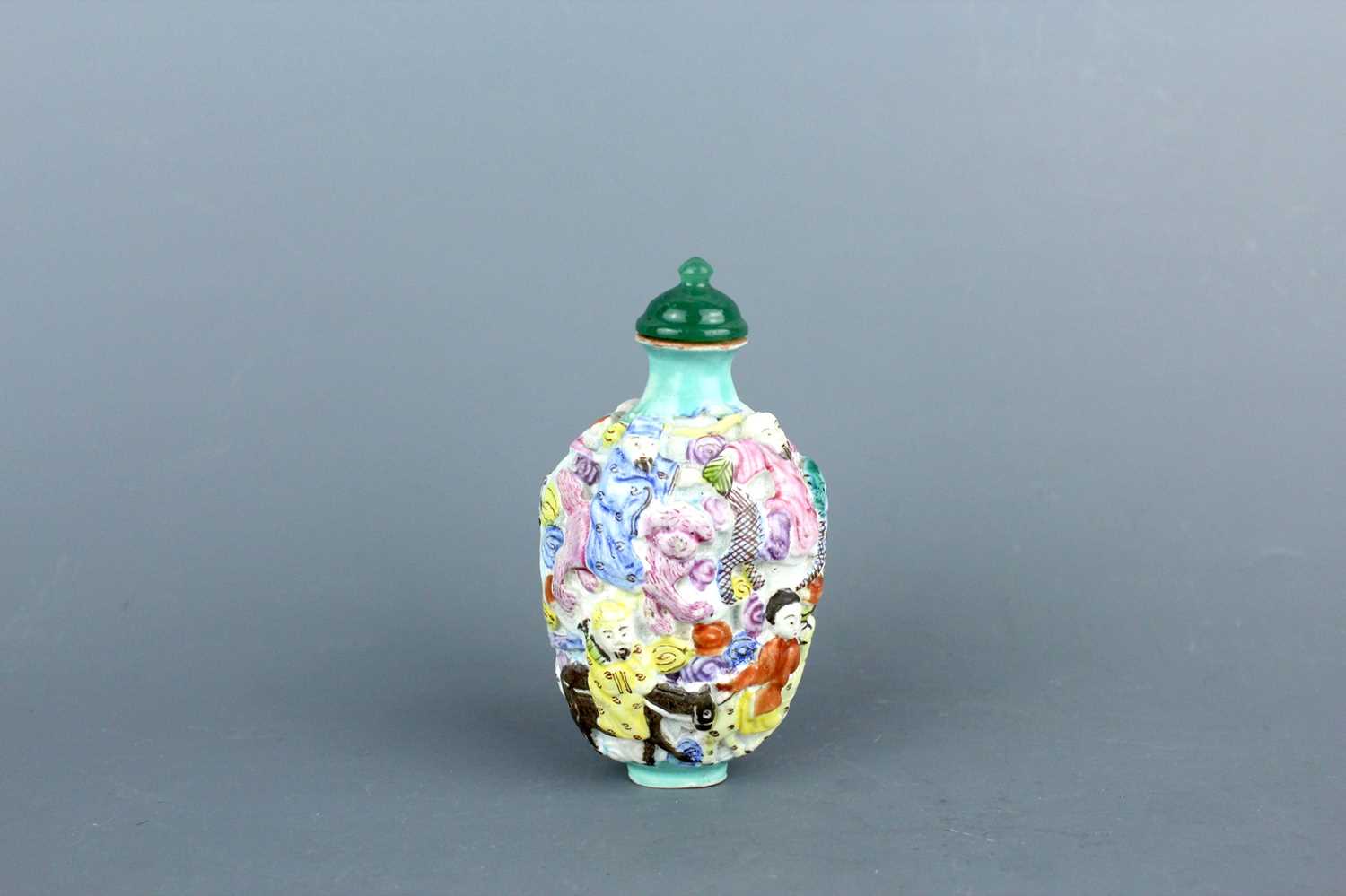 Lot 2074 - A Chinese famille rose ’Eight Immortals’ snuff...