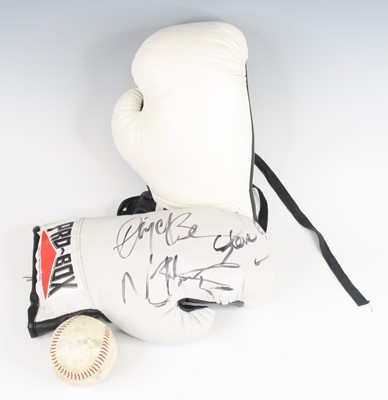 Lot 837 - A pair of Pro-Box white leather boxing gloves,...