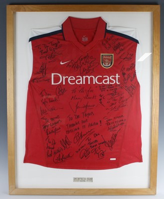 Lot 817 - A replica Arsenal F.C. home shirt for the...