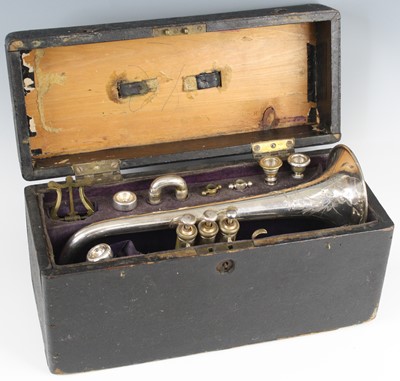 Lot 592 - An F Beeson silver plated cornet, serial...