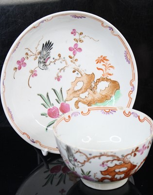 Lot 1060 - A Lowestoft porcelain tea bowl and saucer,...