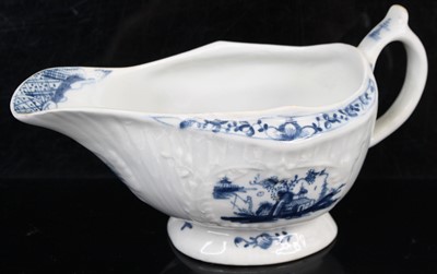 Lot 1057 - A Lowestoft porcelain sauce boat, circa...