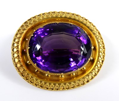 Lot 2620 - A Victorian style yellow metal amethyst set...