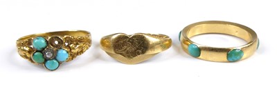 Lot 2608 - An 18ct gold and turquoise set band ring (one...