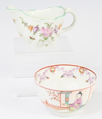 Lot 1061 - A Lowestoft porcelain Low Chelsea ewer cream...