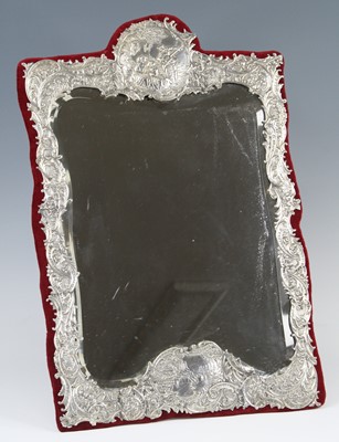 Lot 1115 - A late Victorian silver clad easel dressing...