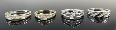 Lot 2704 - A modern 9ct white gold diamond three-stone...