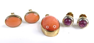 Lot 2653 - A pair of yellow and white metal cabochon...