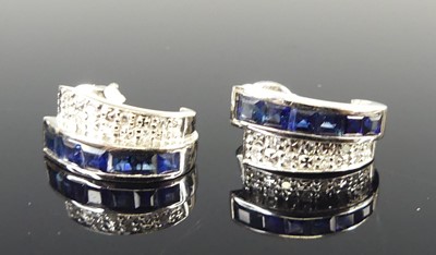 Lot 2684 - A pair of 14ct white gold sapphire and diamond...