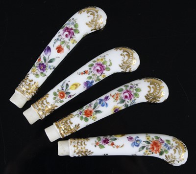 Lot 1063 - A set of four English porcelain knife handles,...