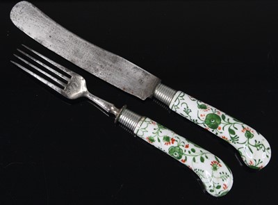 Lot 1066 - A Danish porcelain handled knife and fork,...