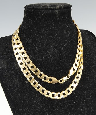 Lot 2673 - A modern 9ct gold flat curblink necklace, with...