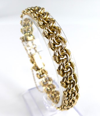 Lot 2728 - A 15ct gold multi-link bracelet, with...