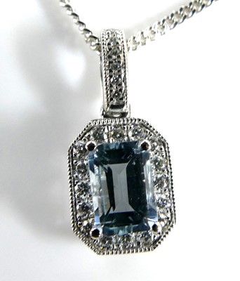 Lot 2689 - A 9ct white gold aquamarine and diamond...