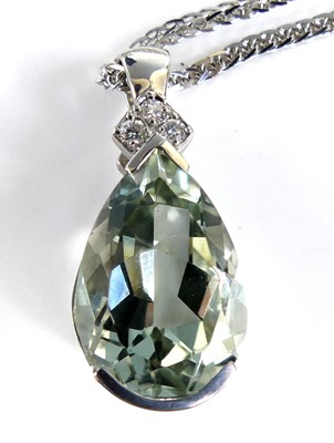 Lot 2690 - A 9ct white gold prasiolite and diamond...