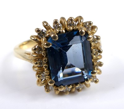 Lot 2715 - A yellow metal blue zircon and diamond...