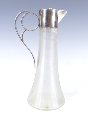 Lot 1137 - An Austrian Art Deco silver topped glass...
