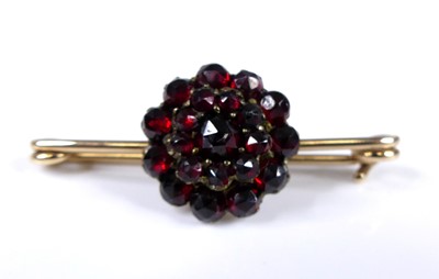 Lot 2718 - A yellow metal garnet circular cluster bar...