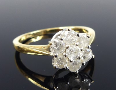 Lot 2722 - An 18ct yellow and white gold diamond circular...