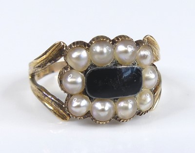 Lot 2742 - A circa 1830 yellow metal black onyx and seed...