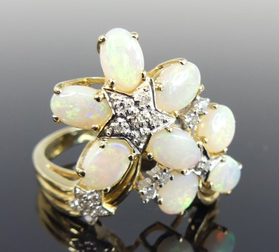 Lot 2746 - A modern 14ct gold opal and diamond set dress...