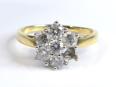 Lot 2748 - An 18ct gold diamond flower head cluster ring,...