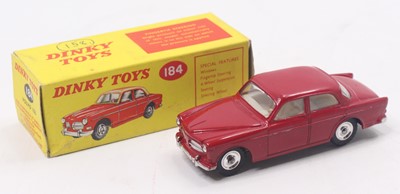 Lot 1254 - Dinky Toys No. 184 Volvo 122S comprising a red...