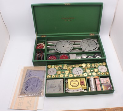 Lot 1603 - A Meccano No. 6A outfit in green cabinet,...