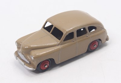 Lot 1273 - Dinky Toys No. 40E Standard Vanguard, in fawn...