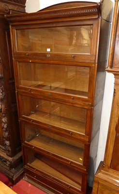Lot 1170 - A 1930s beech five-tier stacking bookcase by...