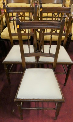 Lot 1347 - A set of three Edwardian walnut salon side...