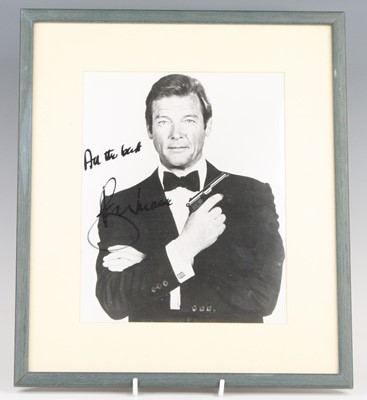 Lot 756 - Roger Moore (1927-2017), a 24 x 19.5cm black...