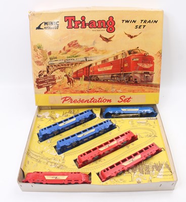 Lot 1933 - A Triang Minic Push and go twin train set,...