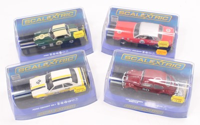 Lot 1982 - A collection of four various plastic cased...