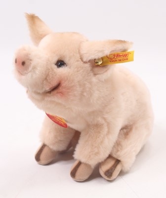Lot 1831 - A Steiff No. 072420 Little Pig, with yellow...