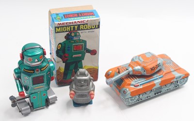 Lot 1952 - Three clockwork tinplate toys to include a...