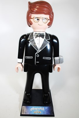 Lot 1814 - A large shop display Playmobil figure, of Rex...