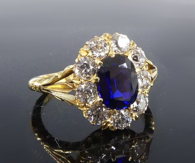 Lot 1156 - An 18ct yellow gold, synthetic sapphire and...